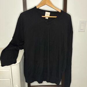 Calvin Klein black sweater. Size XXL.
Possibly a wool blend.